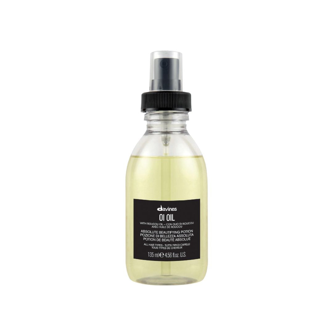 Bottle of Davines OI Oil on a white background