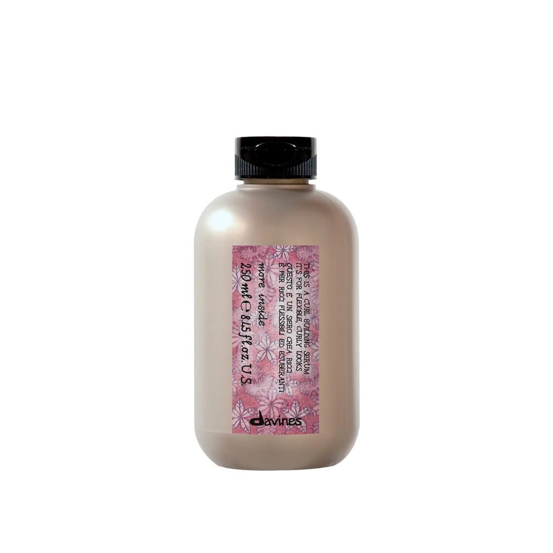 Bottle of Davines hair product on a white background