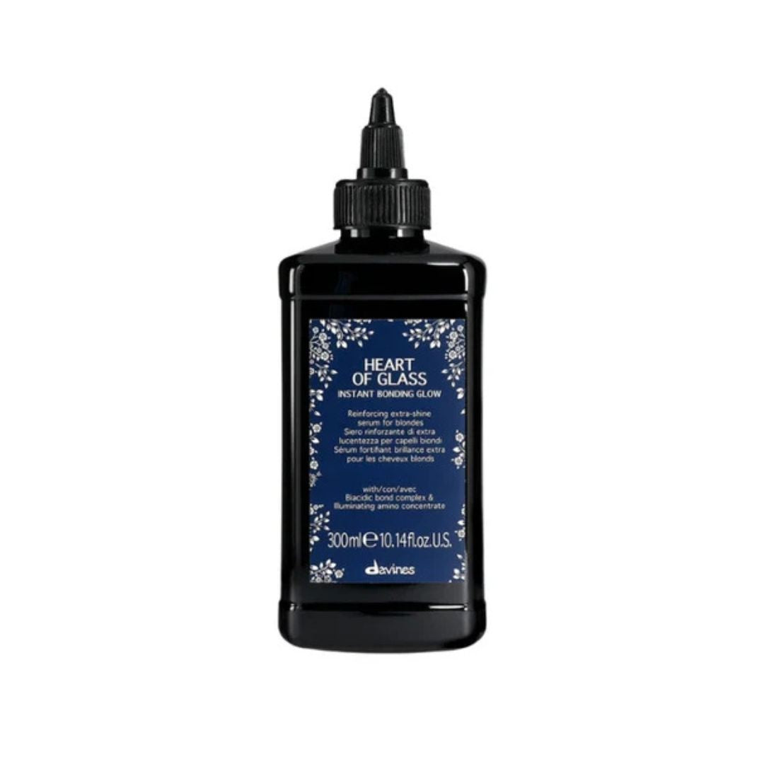 Black bottle of 'Heart of Glass' with blue label on a white background