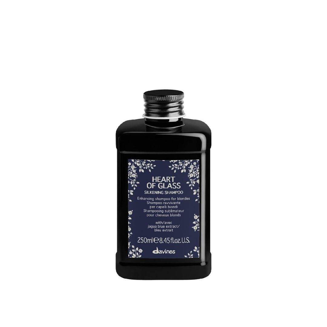 Bottle of 'Heart of Glass' shampoo by davines on a white background